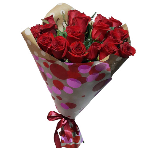 Фото товара 15 красных роз в крафт в Кривом Роге